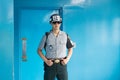JSA within DMZ, Korea - September 8 2017: UN soldier in blue building at North South Korean border guarding the door to North Kore Royalty Free Stock Photo