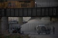 Juarez, Mexico 07-21-2023: migrants wait to be processed by the border patrol in front of the wall in American territory, to reque