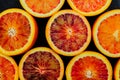 Jucy background made of blood orange slices on black background Royalty Free Stock Photo