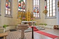 Altar and baptismal font in catholic church Royalty Free Stock Photo