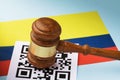Judge gavel, barcode sheet and Colombian flag, the concept of administrative punishment for violation of the regime using QR codes Royalty Free Stock Photo