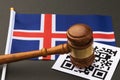 Judge gavel, barcode sheet and Iceland flag, concept of administrative punishment for violation of the regime using QR codes Royalty Free Stock Photo