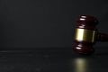 Judge gavel on black wooden background Royalty Free Stock Photo