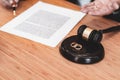 Judge gavel deciding on marriage divorce signing papers. lawyer concept Royalty Free Stock Photo