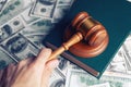 Judge gavel, dollars for business, finance, corruption, money, financial crimes Royalty Free Stock Photo