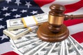 Judge gavel and dollars money against the background of the flag of America. US, Business concept idea, finance, budget, capita Royalty Free Stock Photo