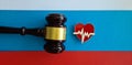 Judge gavel flag of the Russian Federation medicine and heart health. Law and justice in Russia Royalty Free Stock Photo