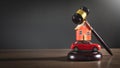 Judge gavel with a house model and toy car on the wooden table Royalty Free Stock Photo