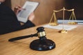 Judge gavel with Justice lawyers, Businessman in suit or lawyer working on a documents. Legal law, advice and justice concept Royalty Free Stock Photo