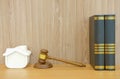 judge gavel law book & house model on wooden desk. real estate d Royalty Free Stock Photo