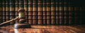 Judge gavel and Law books on a wooden office, closeup