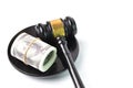 Judge gavel and money banknotes  on a white background Royalty Free Stock Photo
