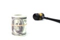 Judge gavel and money banknotes isolated on a white background Royalty Free Stock Photo