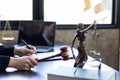 A judge gavel is prepared in the courtroom to be used to give a signal when the verdict is read after the trial is completed.