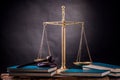 Judge gavel,scale, and books on table