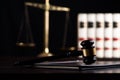 Judge gavel, scales of justice and law books in court Royalty Free Stock Photo