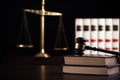 Judge gavel, scales of justice and law books in court Royalty Free Stock Photo