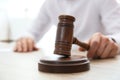 Judge with gavel at table in courtroom. Law and justice concept Royalty Free Stock Photo