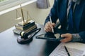 Judge with hammer and scales on table, concept of court and justice, lawyer, justice, consultant Royalty Free Stock Photo