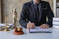 Judge with hammer and scales on table, concept of court and justice, lawyer, justice, consultant Royalty Free Stock Photo