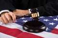 Judge Hands With Gavel And American Flag