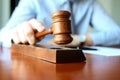 Judge holding gavel in courtroom Royalty Free Stock Photo