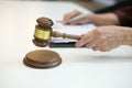 judge holding legal law gavel with book at courtroom. lawyer att Royalty Free Stock Photo