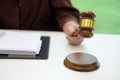judge holding legal law gavel with book at courtroom. lawyer att Royalty Free Stock Photo