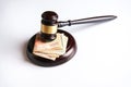 Judge mallet or auctioneer`s hammer and money stack Royalty Free Stock Photo