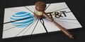 Judge's gavel and broken logo of ATT. Editorial conceptual 3d rendering