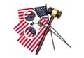 Judge`s gavel with handcuffs and american flag on white. American laws concept. Top view