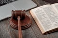 Judge`s gavel, laptop and Bible