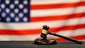 Judge`s gavel and over USA flag. Symbol for jurisdiction. Law concept a wooden judges gavel on table in a courtroom or Royalty Free Stock Photo