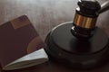 Judge`s gavel and passport on wooden table Royalty Free Stock Photo