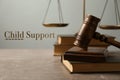 Judge`s gavel, scales of justice and books on marble table. Child support concept Royalty Free Stock Photo