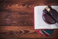 Judge`s gavel on top of books with wooden backround Royalty Free Stock Photo