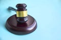 Judge`s hammer on blue background. the concept of justice in medicine. statement of claim Royalty Free Stock Photo