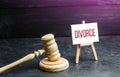 Judge`s Hammer and Divorce Easel. Concept of divorce and division of property through a court decision. Conflict resolution.