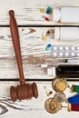 Judge`s hammer and drugs. Royalty Free Stock Photo