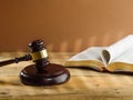 Judge`s Wooden Gavel, Open Book On A Beige Background. The Concept Is Judgment And Justice. Constitution, Law, Courtroom. Judge,