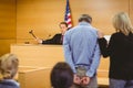 Judge about to bang gavel on sounding block Royalty Free Stock Photo