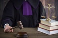 Judge with a wooden judge`s . Waga sprawiedliwoÃâºci.