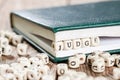 Judge word written on a wooden block. Royalty Free Stock Photo