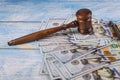 The judge& x27;s gavel, banknotes of American dollars on the business, finance corruption money financial crime Royalty Free Stock Photo