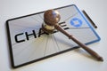 Judge's gavel and broken tablet computer screen with logo of CHASE. Editorial conceptual 3d rendering
