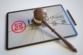 Judge's gavel and broken tablet computer screen with logo of ICBC. Editorial conceptual 3d rendering