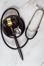 A judge's gavel and a physician's stethoscope. access and entitlement to health care regardless of race, religion