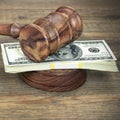 Judges or Auctioneer Gavel And Dollars Cash On Wooden Table Royalty Free Stock Photo