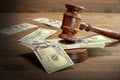 Judges or Auctioneer Gavel And Money On The Wooden Table Royalty Free Stock Photo