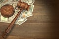 Judges or Auctioneer Gavel And Money On The Wooden Table Royalty Free Stock Photo